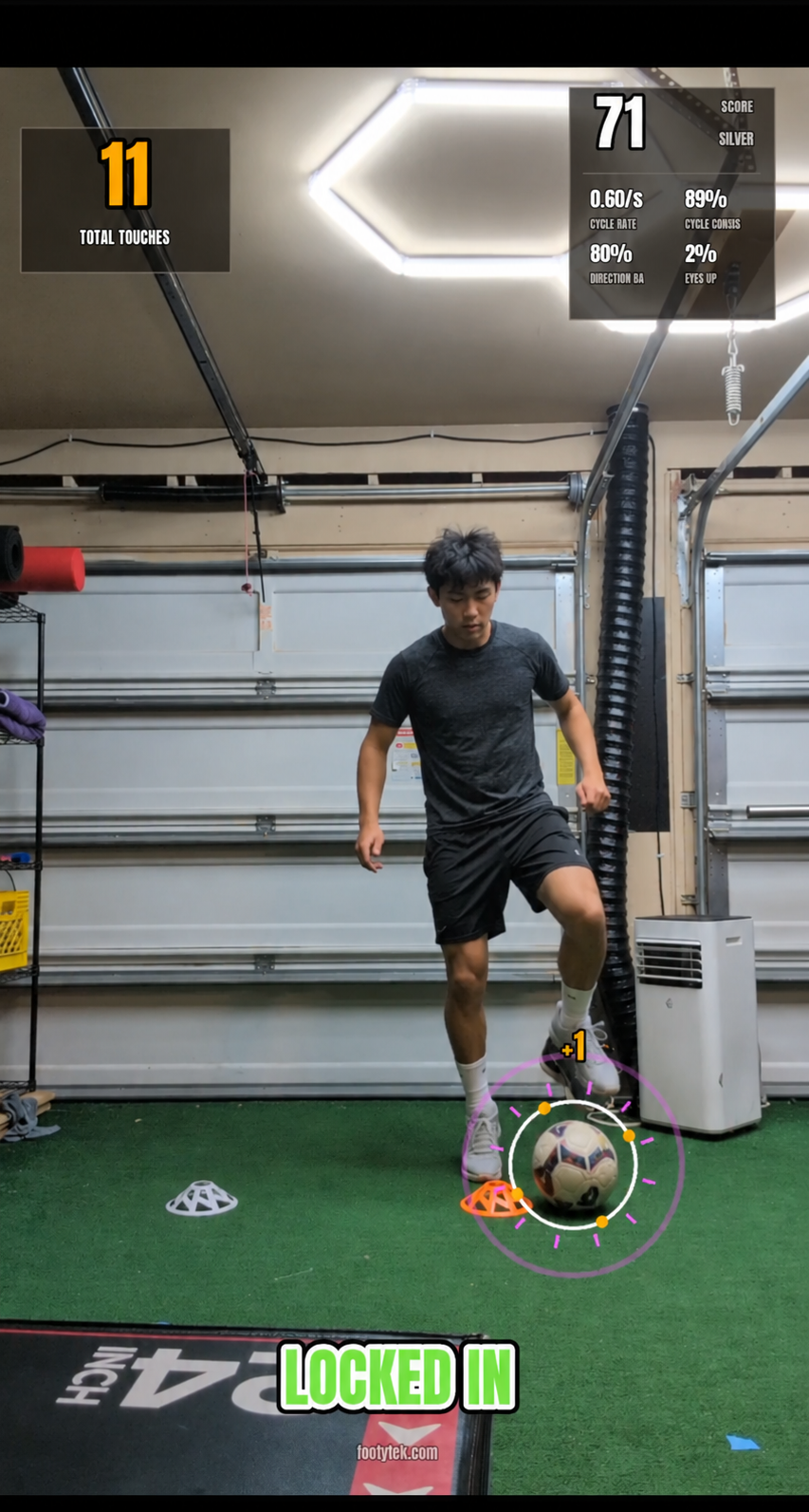 FootyTekniq video feedback showing a player training with touch and score overlays